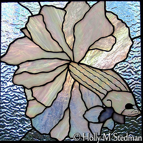 Stained glass panel of a white fish