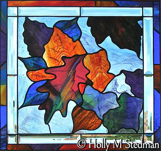 Stained glass panel of autumn leaves