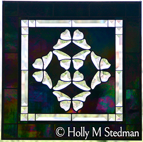 Stained glass panel with bevelled butterflies