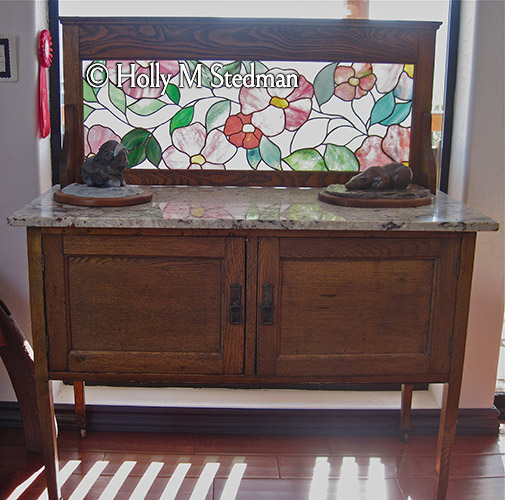 Flowery Stained glass panel installed in a cabinet