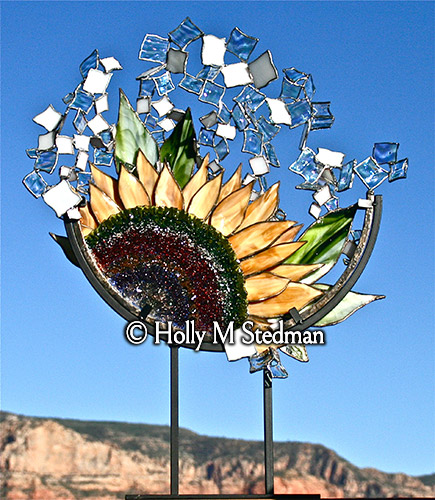 Stained glass sculpture of a sunflower