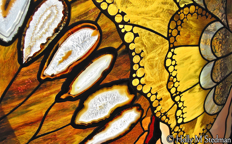 Close up view of Mariposa restaurant panel